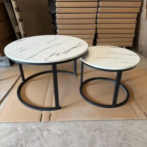 2 pc nesting coffee tables with a white wooden marble effect top and a black metal frame