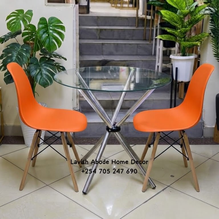Glass Dining Table Set Kenya with Orange Eames Chairs – Modern 2-Seater Dining Furniture