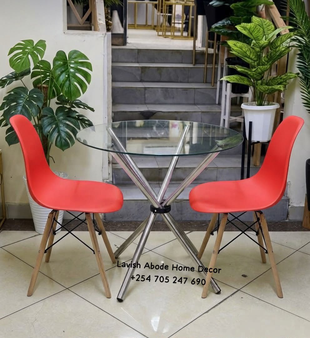 2-Seater Glass Dining Table Set with Red Eames Chairs – Modern Dining Furniture | Dining Sets Kenya