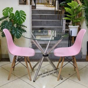 2-Seater Glass Dining Table Set with Pink Eames Chairs – Modern Dining Furniture | Dining Sets Kenya