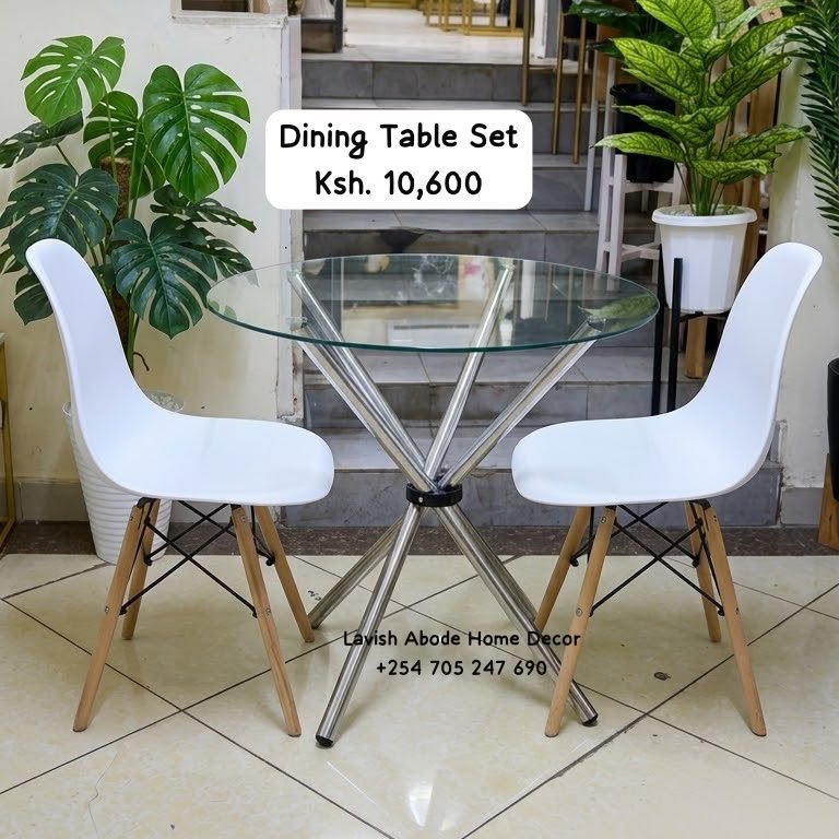 2-Seater Glass Dining Table Set Kenya – Modern Table with White Eames Chairs