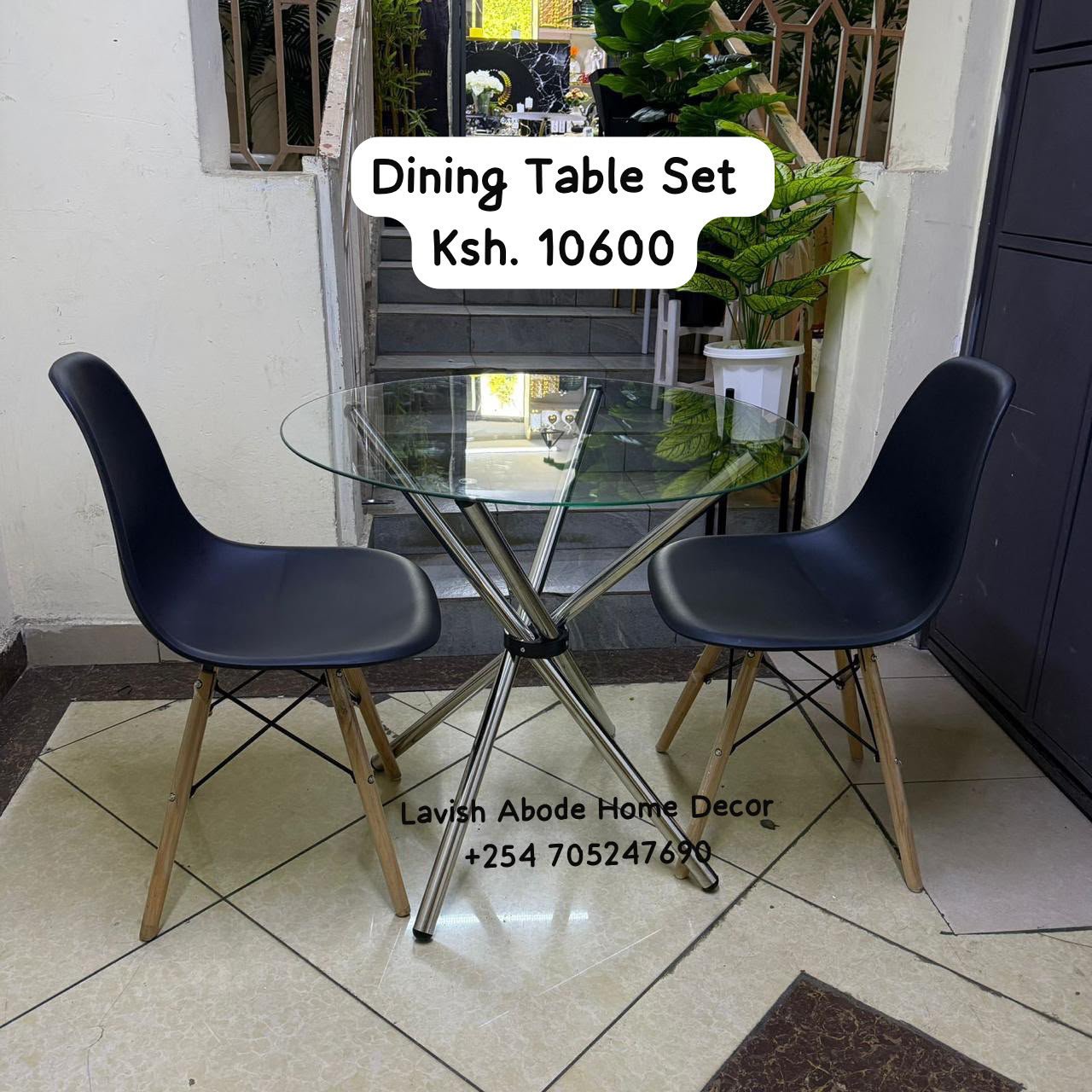2-Seater Glass Dining Table Set Kenya – Modern Table with Black Eames Chairs