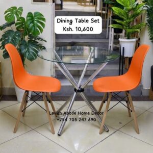 2-Seater Glass Dining Table Set Kenya – Modern Table with Orange Eames Chairs